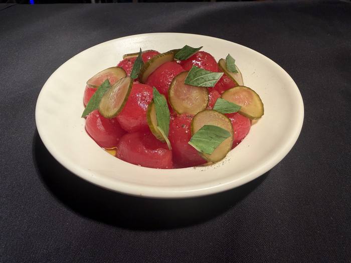 Baby vine tomatoes with fermented cucumber and basil at Table at 464